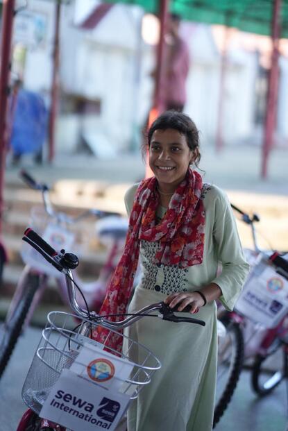 SHE RIDE bicycle distribution